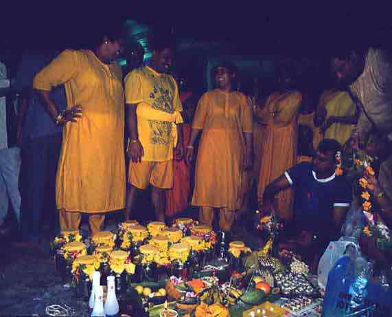 A group of devotees preparing their palkudams at the Vaikuntha Perumal Temple, Serangoon Road