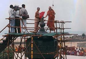 His Holiness inspecting the kalasam upon one of the temples